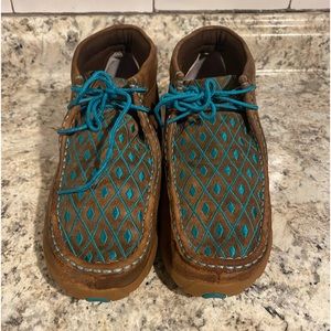 Women’s Twisted X Tan with Teal highlights.